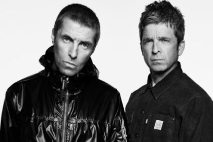 OASIS donate guitar for auction to kick-start big summer of music in Manchester
